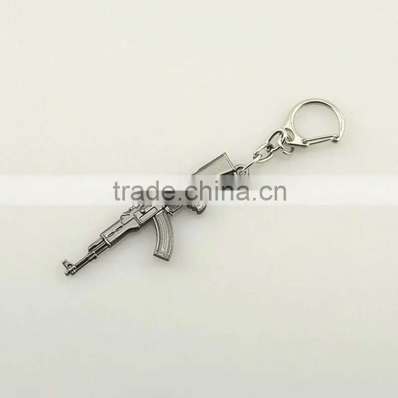 Small gift silver plated metal gun design stainless steel keychain for men