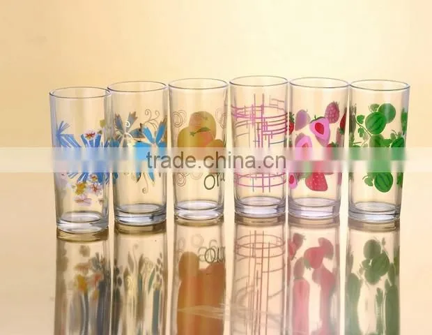 glass cup with paper decal pattern