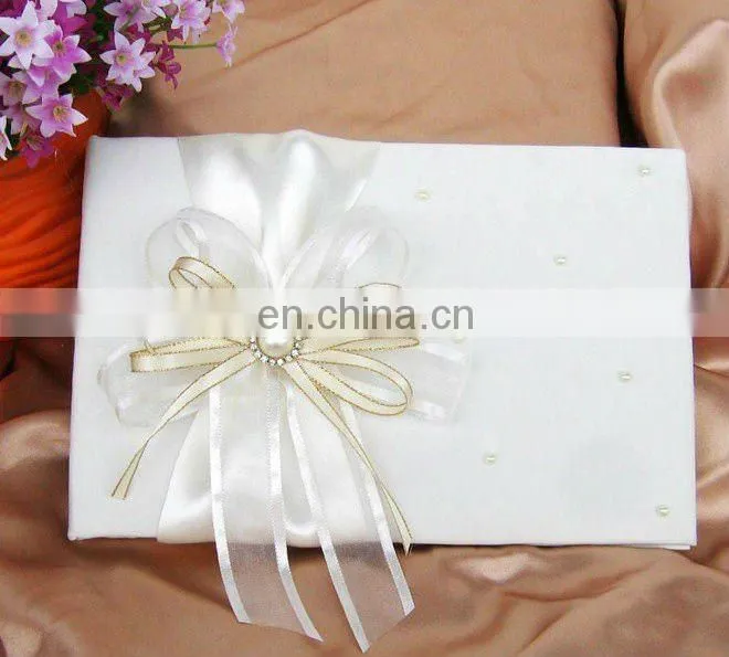 Graceful bow design white wedding guest book faovrs