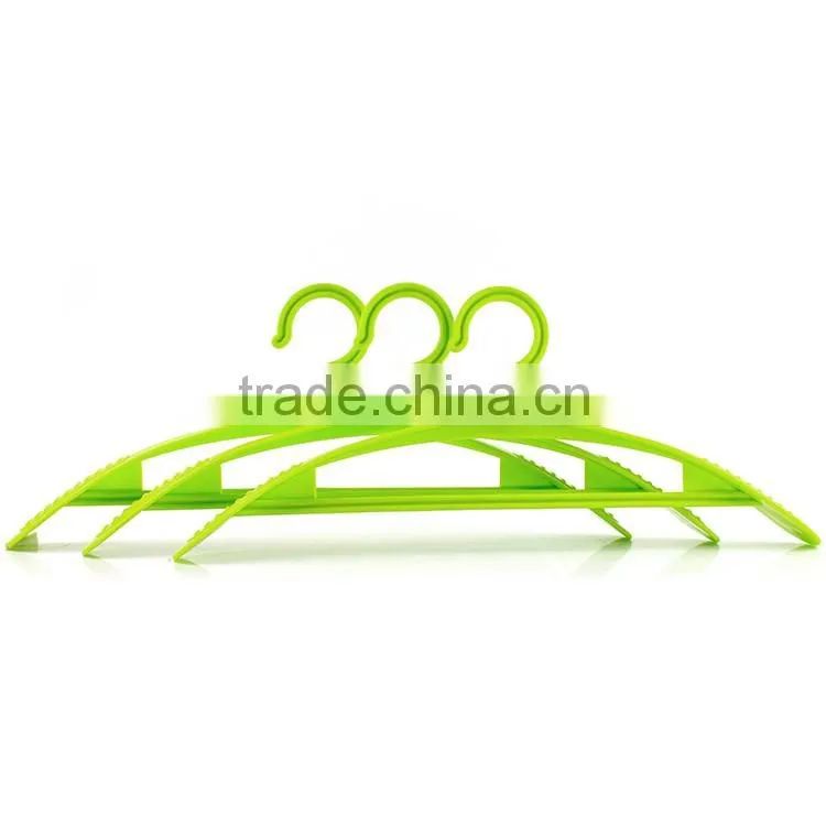 green plastic coat clothes hanger