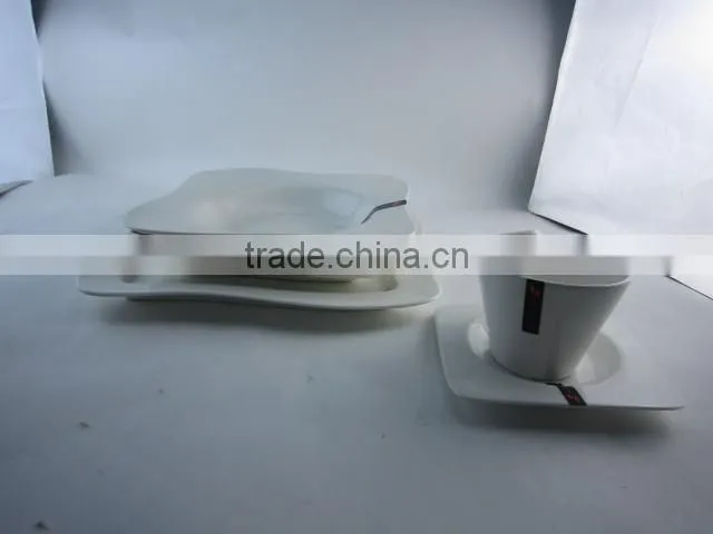 white waved porcelain dinner set with tea pot
