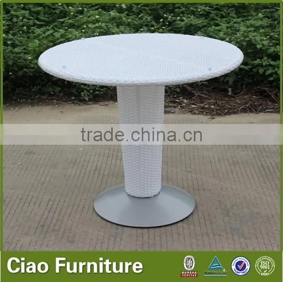 fiberglass and rattan outdoor table