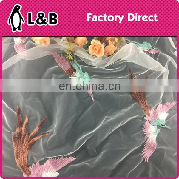 High quality popular emboridery polyester net lace fabric