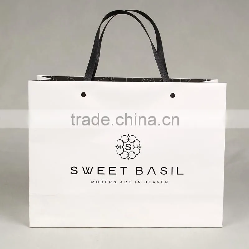 Recyclable medium hand length handle specialty paper bag for shopping packaging