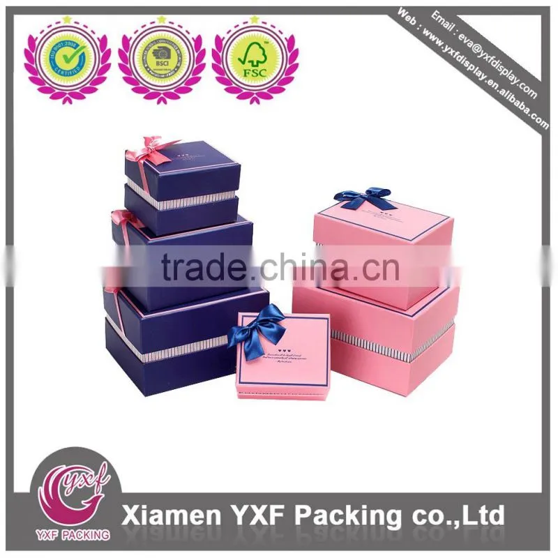 Paperboard gift box with silk ribbon decoration