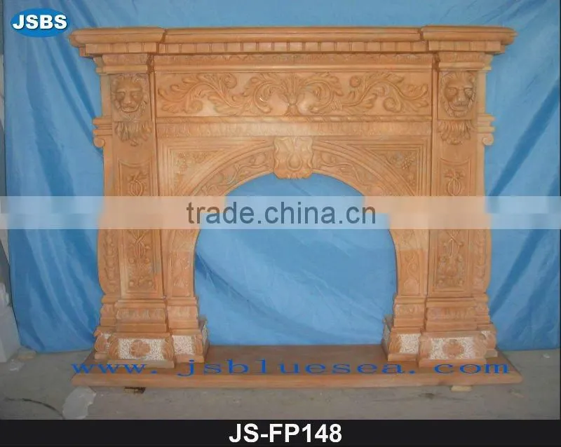 Stone carving of white fireplace mantel