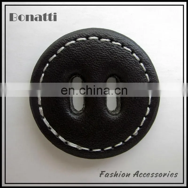 black leather button