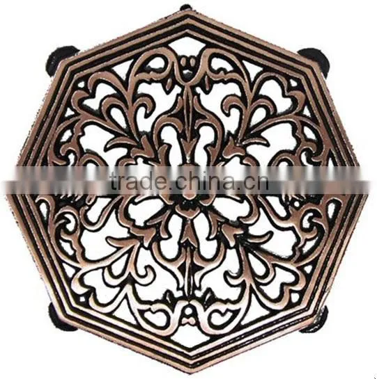 octagon shape antique cast iron trivets