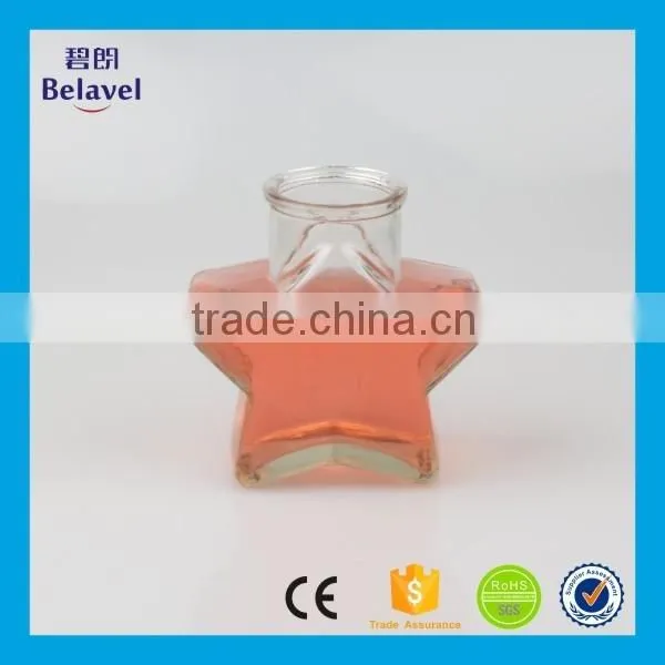 Xuzhou factory supply five star shaped cheap clear glass bottle
