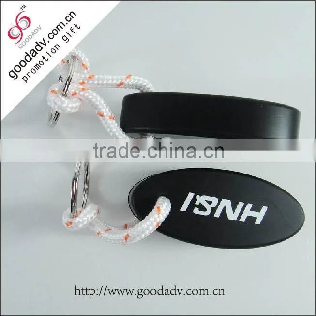 Promotional souvenir floating plastic keychains pu leather keychain