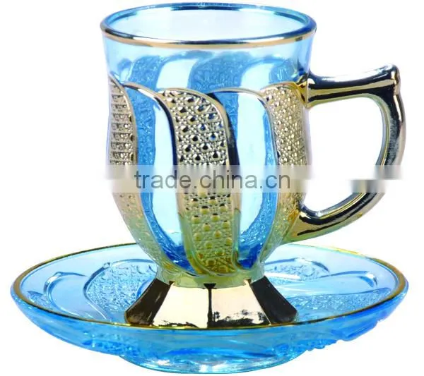 Golden tea cup and saucer set