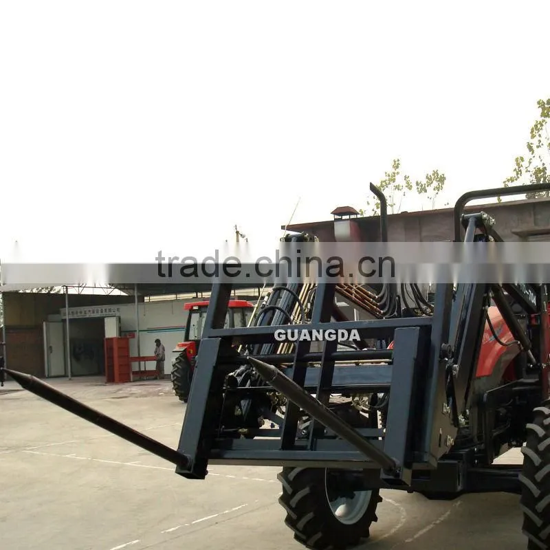 Bale spear loader for farm tractors