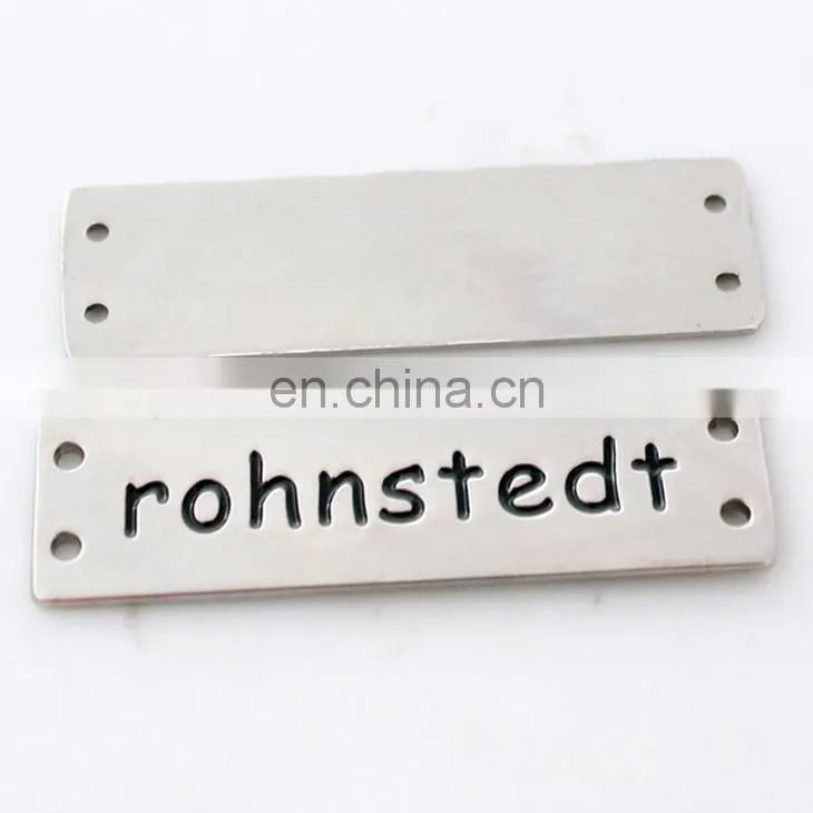 Professional Garment Decoration Use Custom Nikcel Plated Engraved Logo Type Jeans Metal Label With Holes
