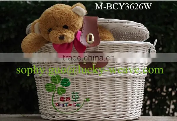 white wicker bicycle basket with handle