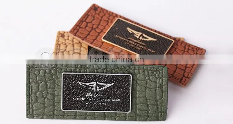 Colorful metal with genuine jeans leather label