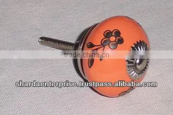 ceramic white knob with green circles