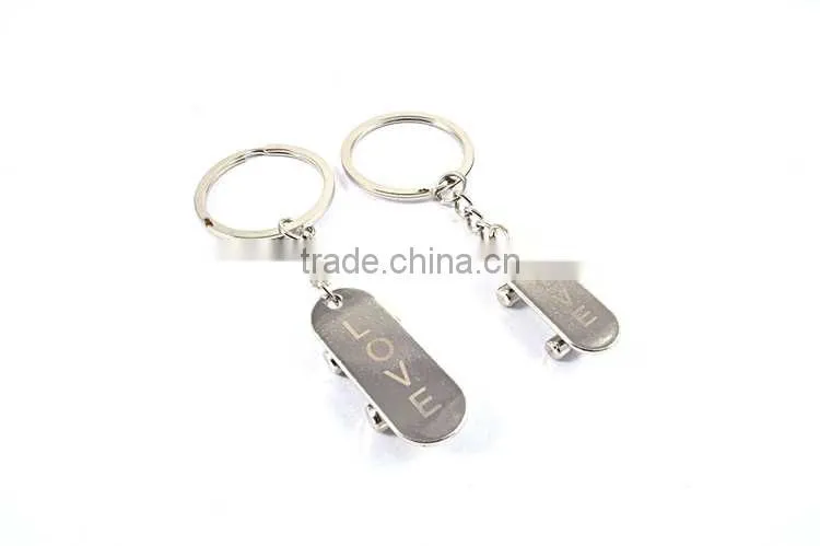 promotional items custom logo metal skateboard keychains