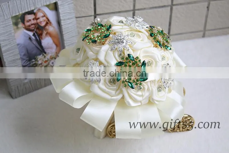 Romantic wedding bouquet full of crystal beads and green brooches
