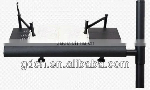 Portable folding notebook desk stand with mouse pad in bed