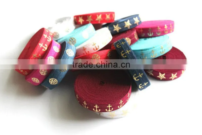 5/8" Fold Over Elastic Red with Gold Stars - Pattern, Metallic, Printed Elastic Band