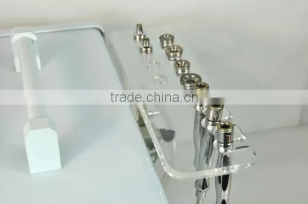 Portable microdermabrasion beauty apparatus