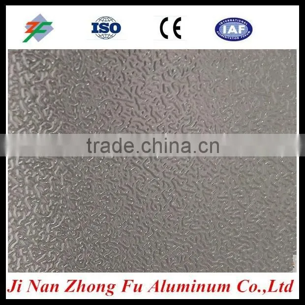 Embossed surface treatment and 1000 series grade aluminum sheet