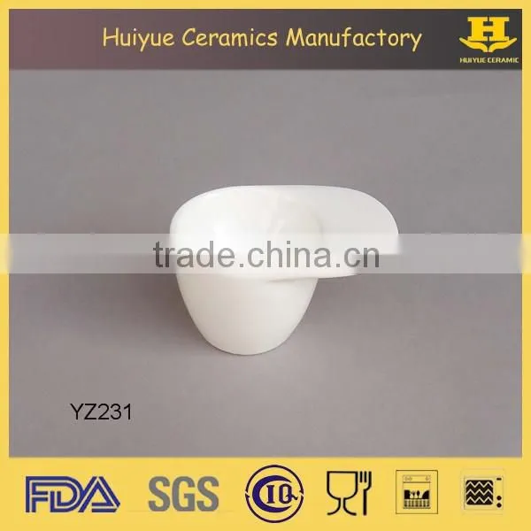 white ceramic egg holder, egg cup