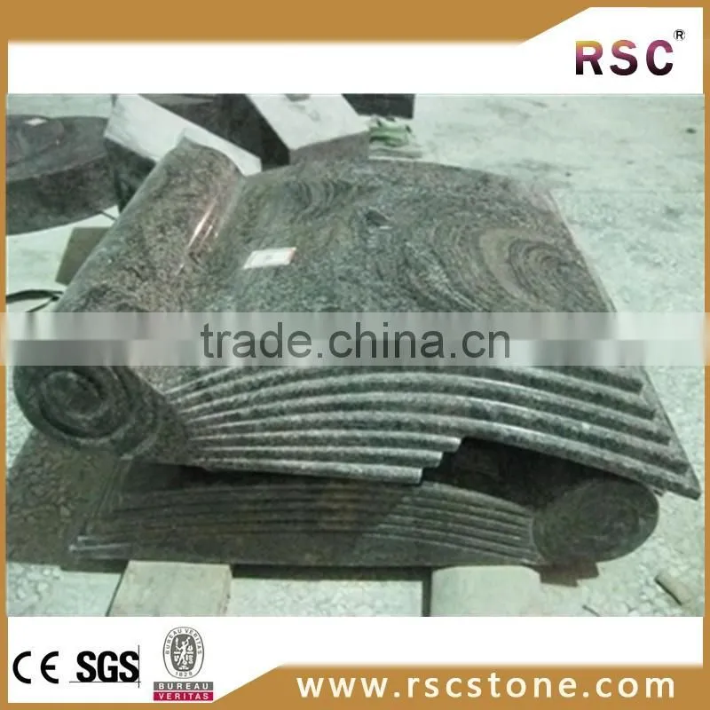 Grey cross granite tombstone