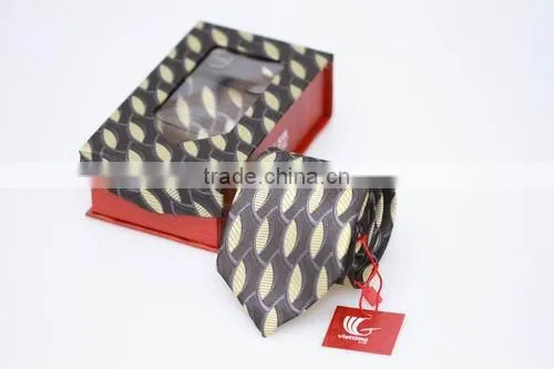 Set of silk neck tie with cufflinks and handkerchief with various colors and design