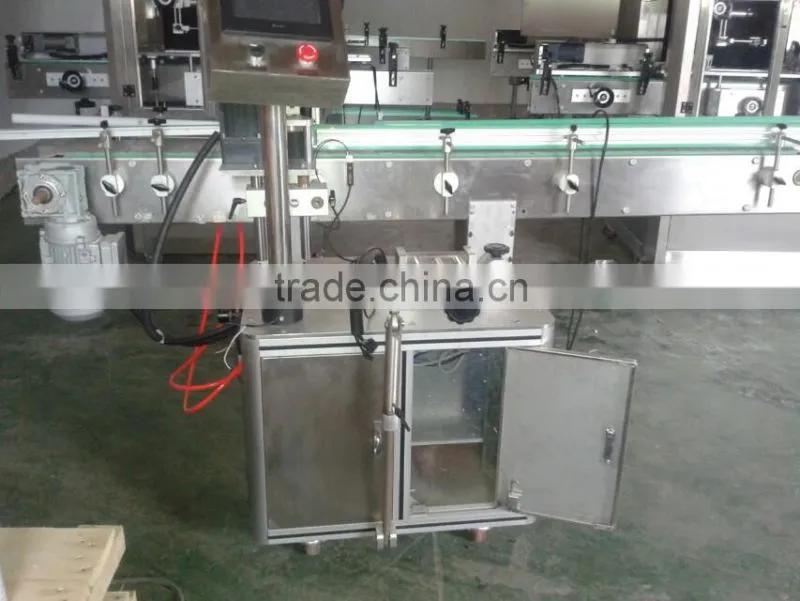 Automatic self-adhesive bottle labeling machine