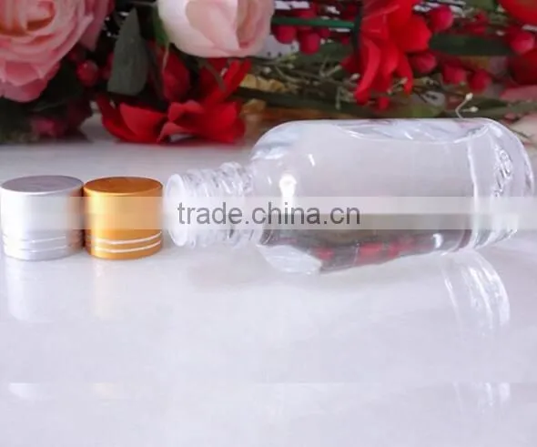 Small wine glass bottle with golden lid odd-shaped glass wine bottle