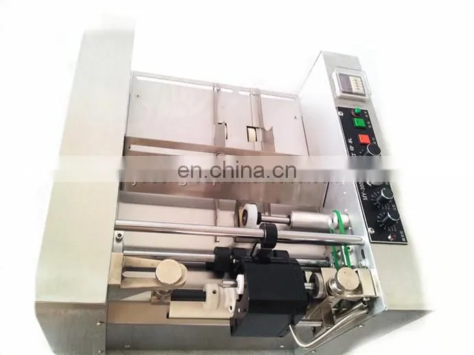 MY-300 automatic batch/lot/series number expiry date embossing printing machine for plastic bags/aluminum foil