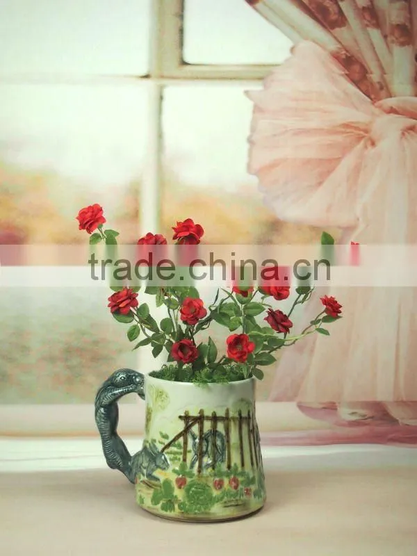 ceramic handle vase with flower design