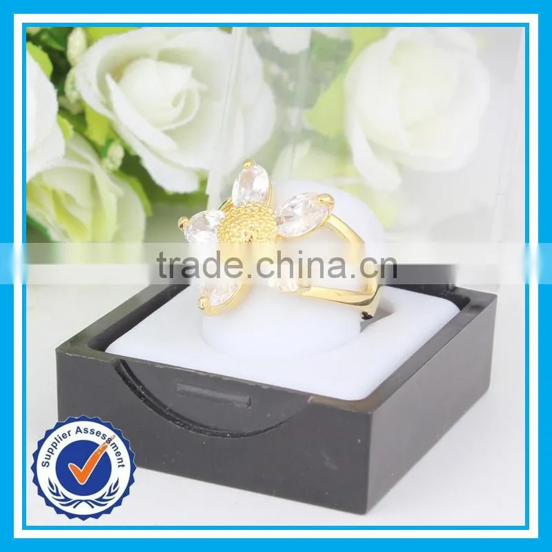 2015 yiwu wholesale korean fashion gold flower models ring for women