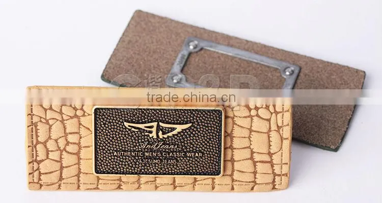 Colorful metal with genuine jeans leather label