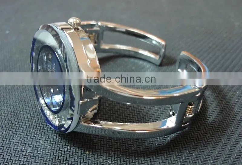 Floating bead deep blue cuff watch
