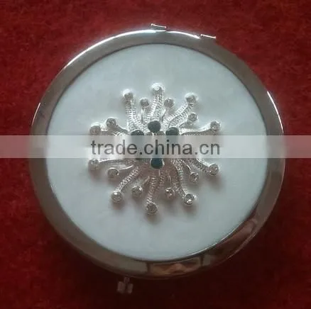 black handmade compact mirror with metal octopus decor