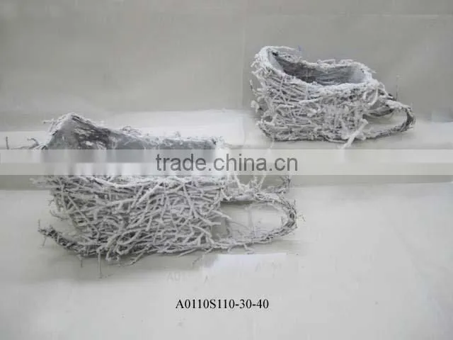 indoor rattan boot planter with snow