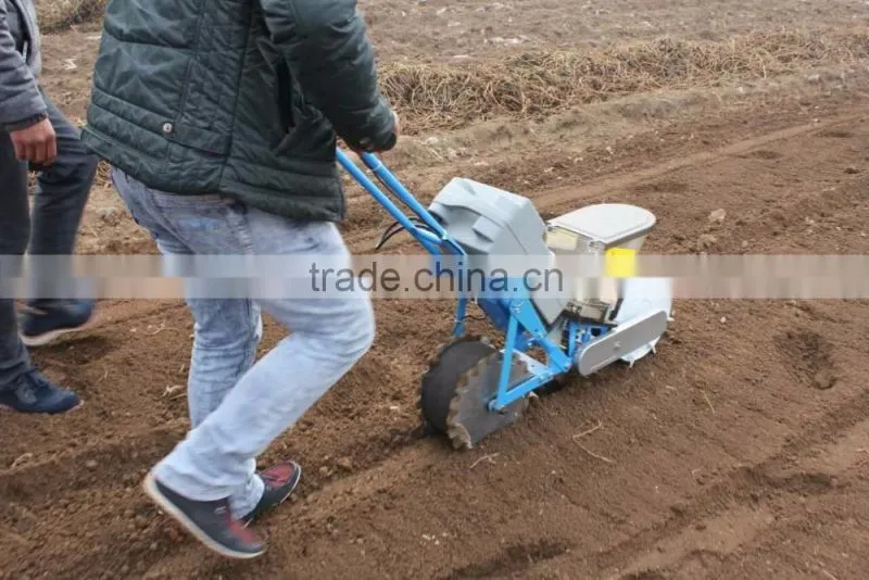 Manual operated single row corn planter