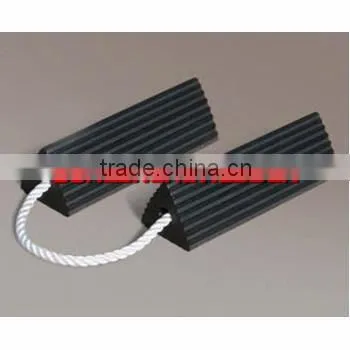 Automotive Wheel Chock with Pull Rope attached.