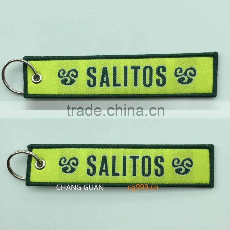 The bottle opener woven label bag charms