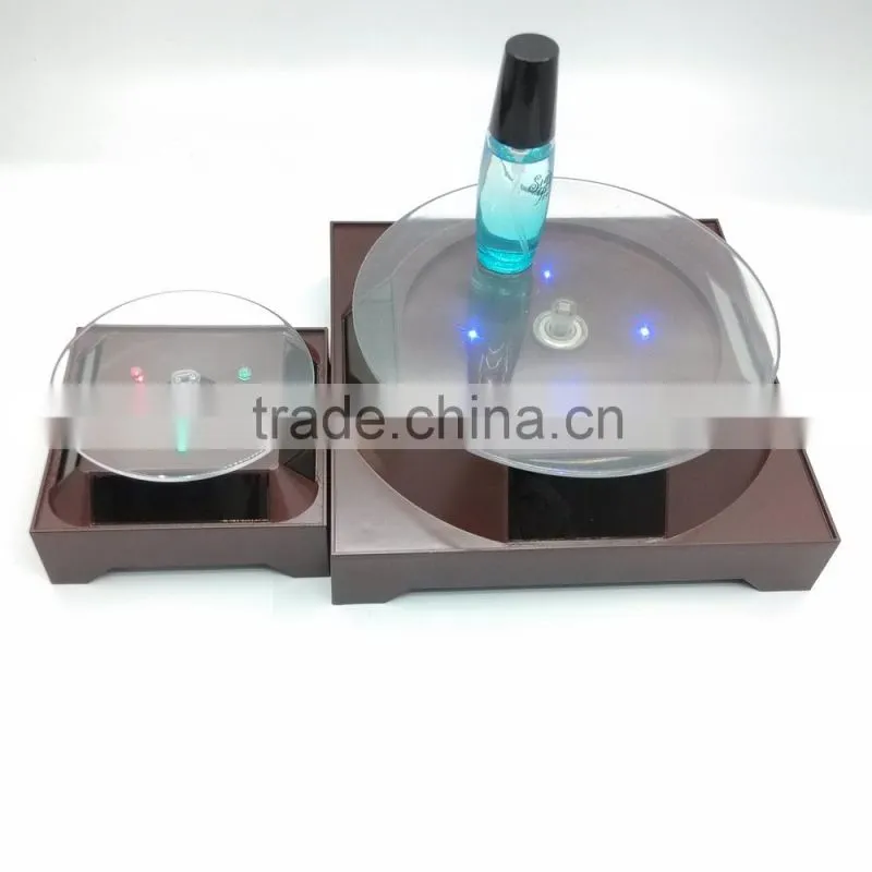 2015 New solar power rotating display stand for iphone 6 plus