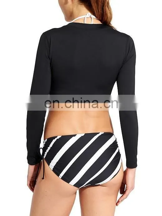 Ladies solid black swimming wear long sleeve cross front crop rash guard