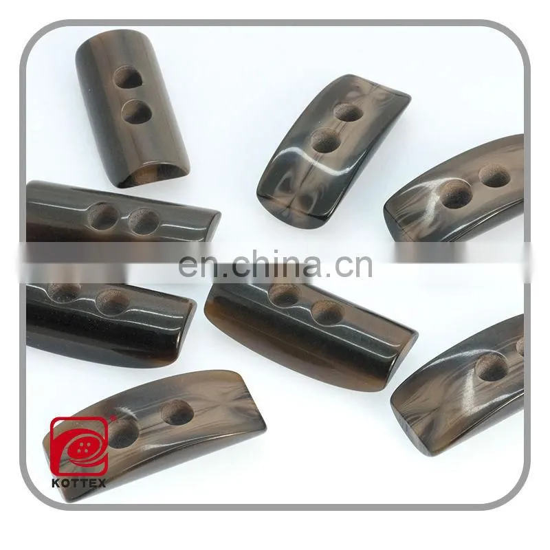 special shaped smooth surface resin imitation horn toggle buttons,2014 plastic toggle button,garment accessories