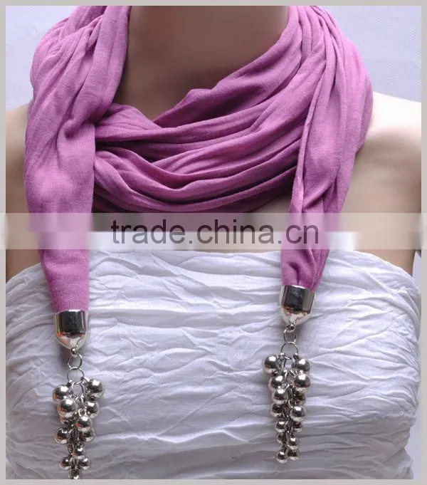 Women scarf with jewelry pendant