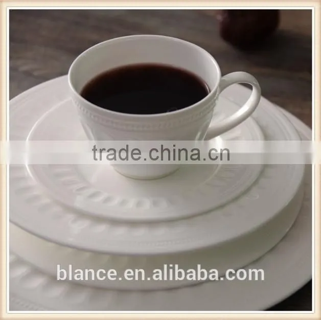 white ceramic European coffee cup set