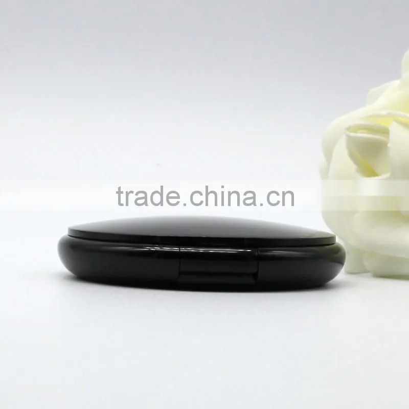 Round compact powder container with mirror