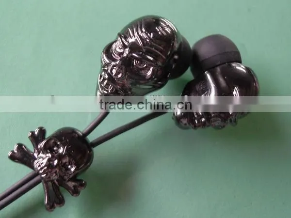 Fashional skull shape crystal earphones headsets metal earbuds