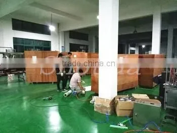 China Manufactureer Full automatic weighing filling capping machine