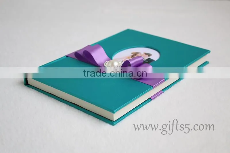 Unique wedding guest book with ribbon bow